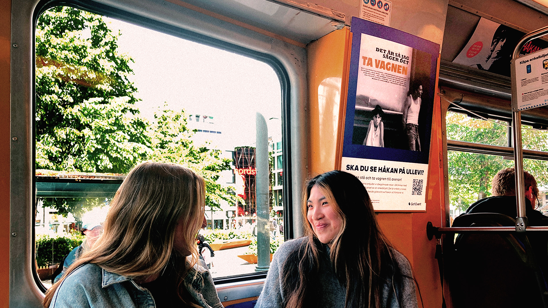 Two women sitting on a tram in Gothenburg